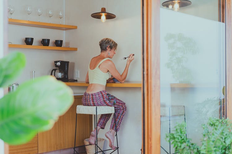 Elderly Woman Eating Her Healthy Breakfast