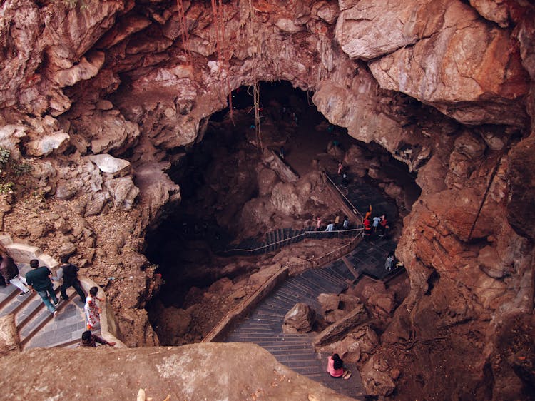 People Inside A Cave