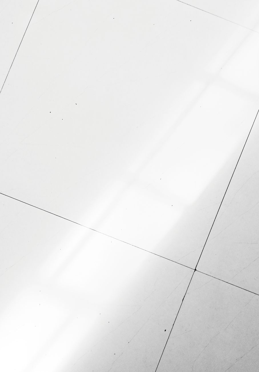 Micro-polished tile floor reflecting natural light