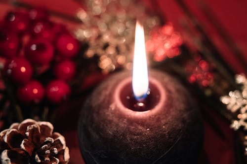 Lighted Black Round Candle