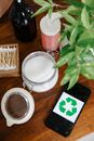 Top view of smartphone and cosmetic products