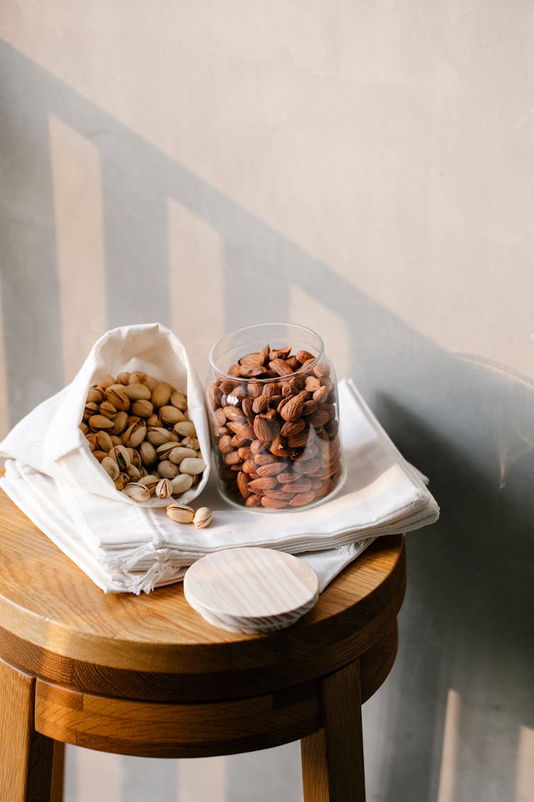 Delicious Nuts On Wooden Table