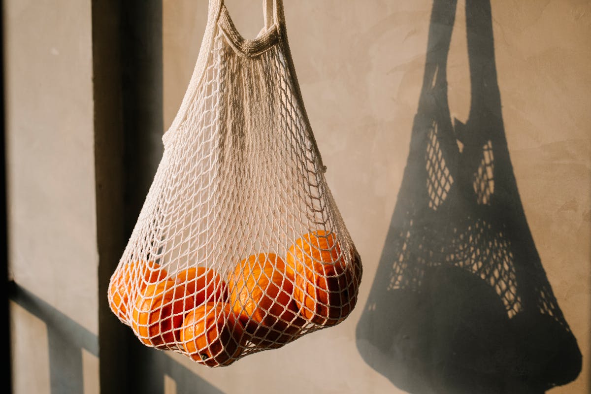 Bag of oranges near wall