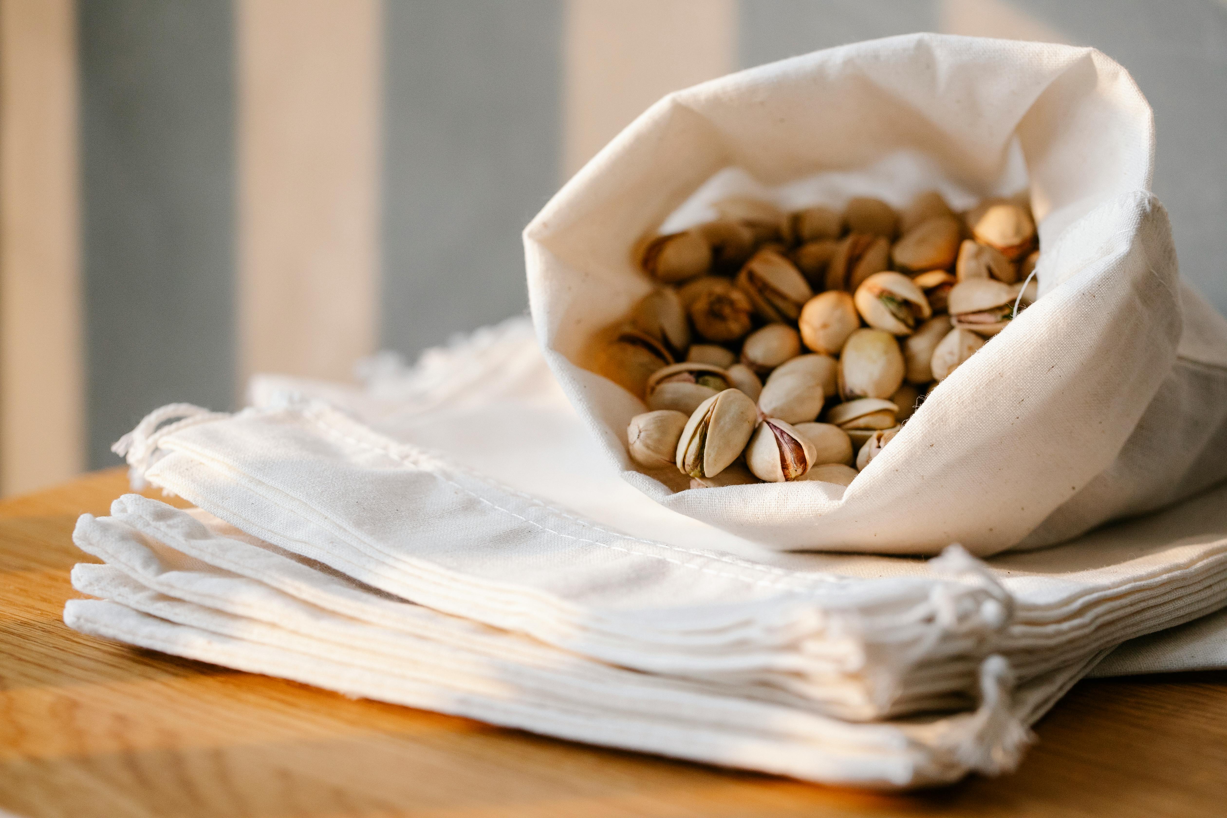 sack of pistachios on table