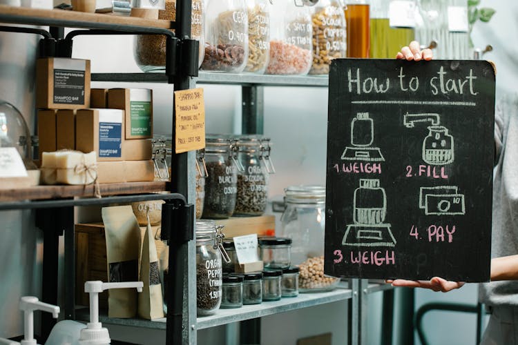 Assorted Natural Products On Shelves In Eco Shop