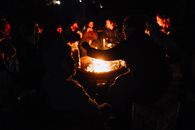 People Gathered Around the Fire Pit