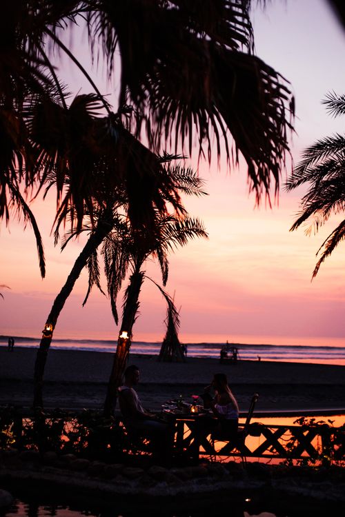 Couple enjoying a romantic dinner on the beach
