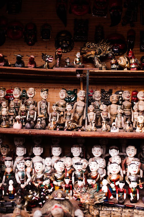 Traditional Dolls on Shelves in Shop