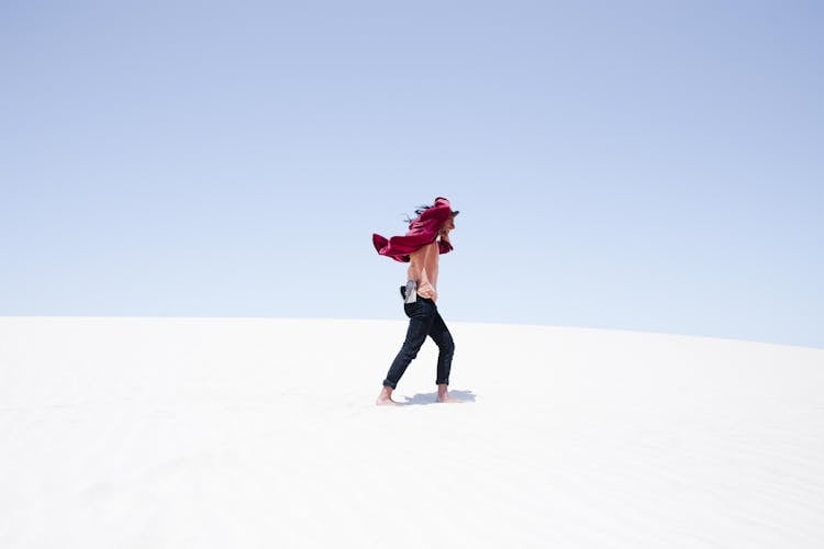 Man Walking Sand Dunes