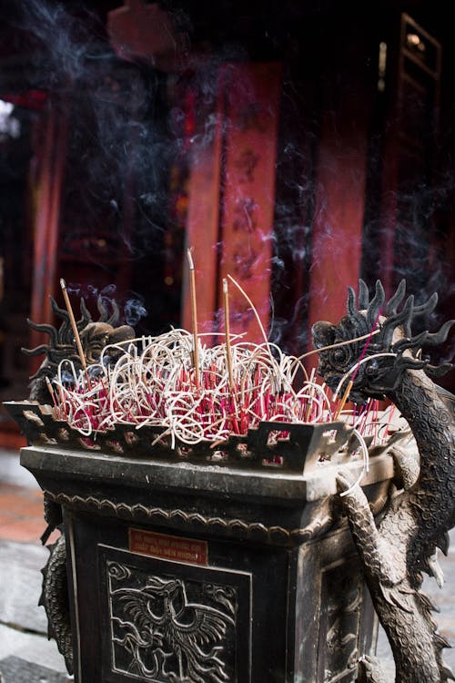 Free Incense Burning in Iron Pot in Temple Stock Photo