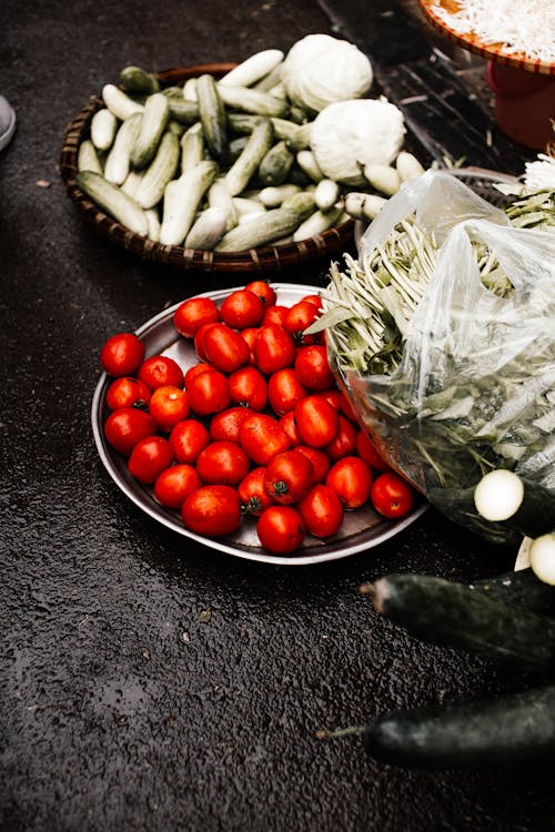 Red Tomatoes on Stainless Steel Round Tray