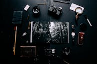 Traveler Equipment on Black Background Flat Lay