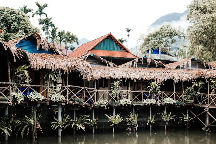 Houses On Stilts Over The Body Of Water