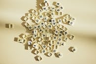 White Scrabble Tiles on White Background