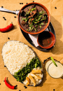 White Rice With Green Vegetable and Red Chili on Brown Wooden Table