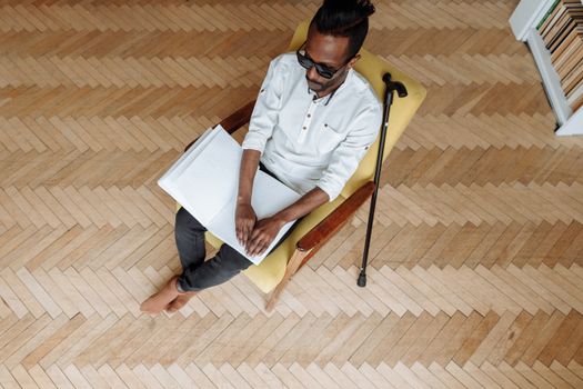 Man in White Dress Shirt Sitting on Chair
