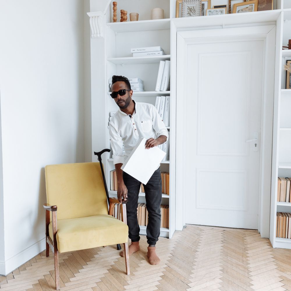 De Beauvoir Town — movers delivering furniture from a van