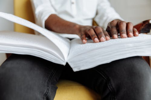 A Person using Braille