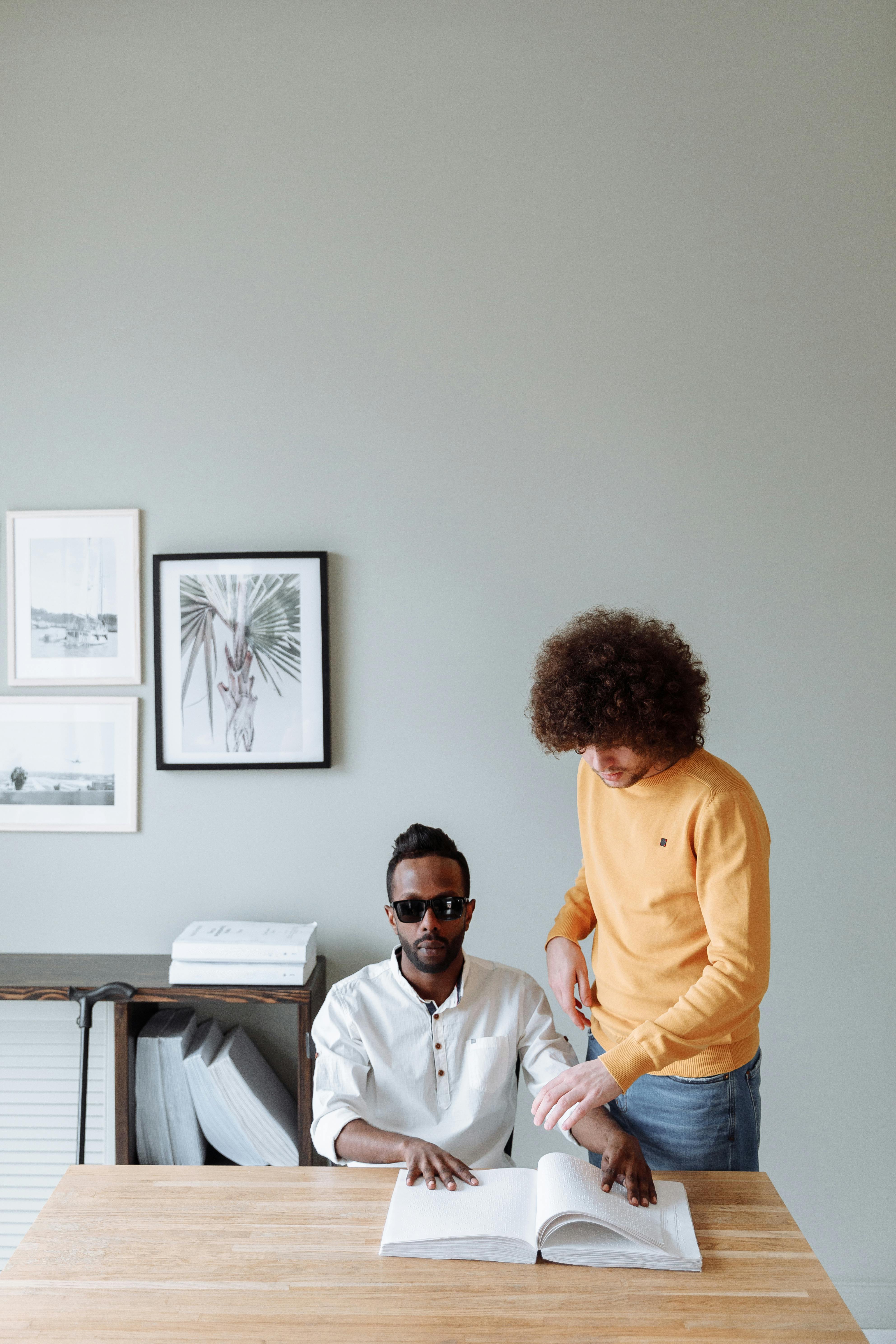 A Man Sitting at the Table