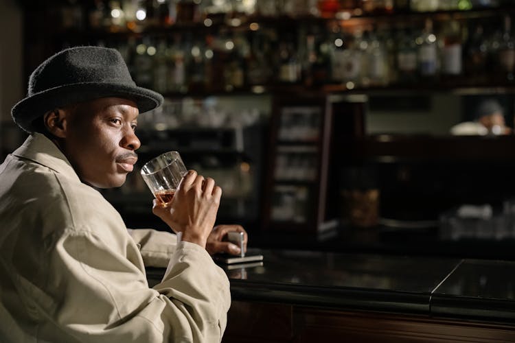 Photo Of Man Drinking Whiskey