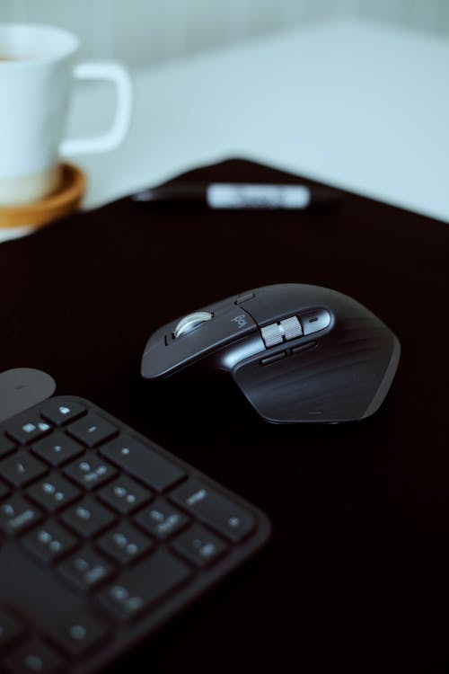 Black Computer Mouse on the Table