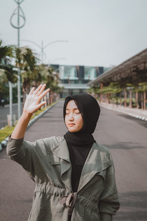 A Woman in Black Hijab