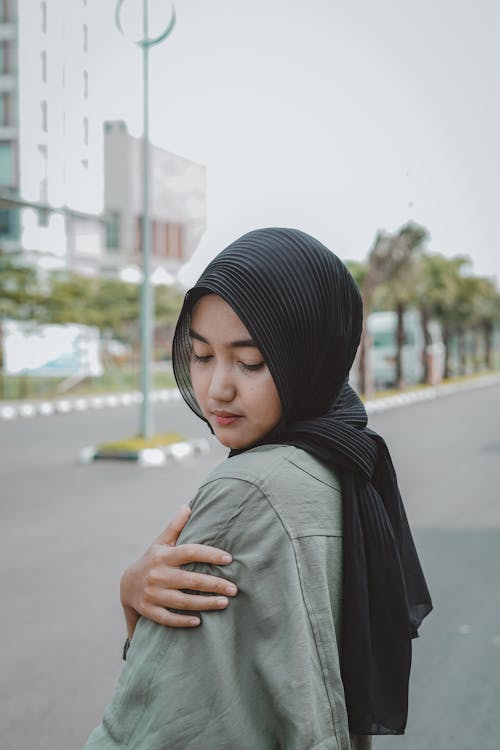 A Woman in Black Hijab