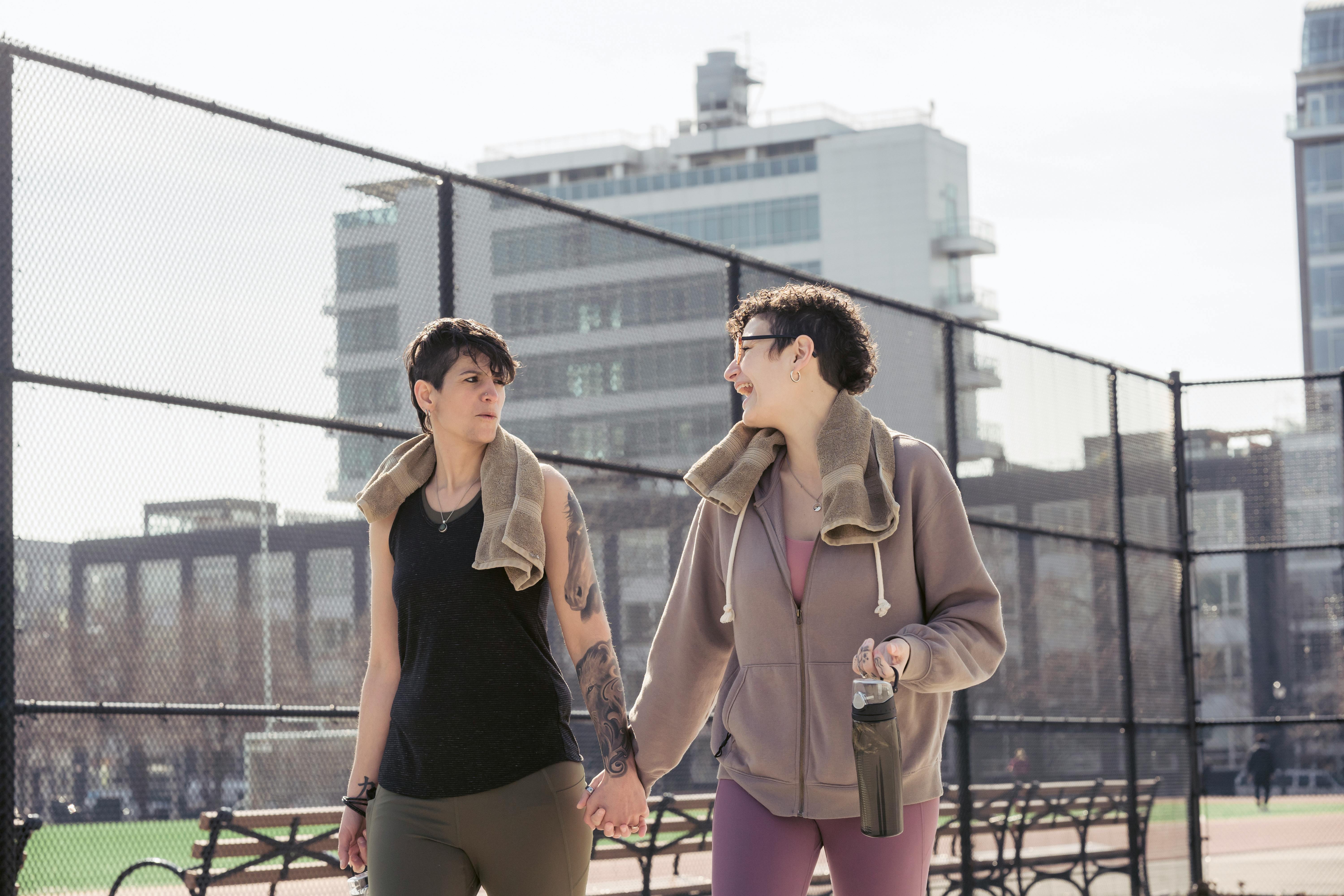 close girlfriends after workout in city