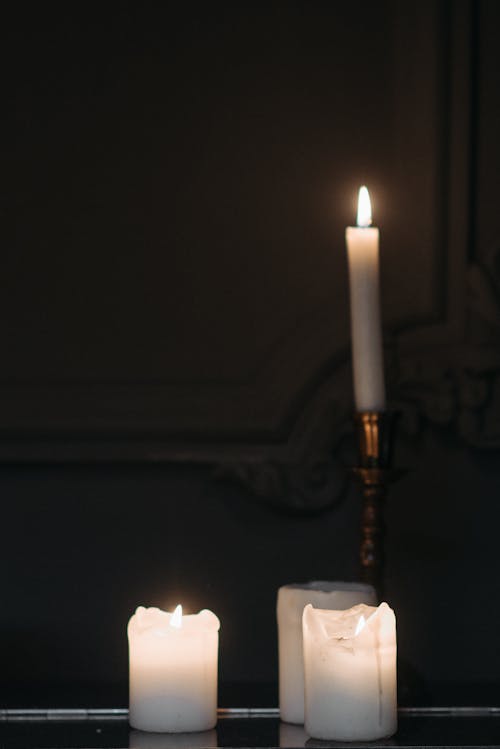 Burning Candles in Close Up Photography
