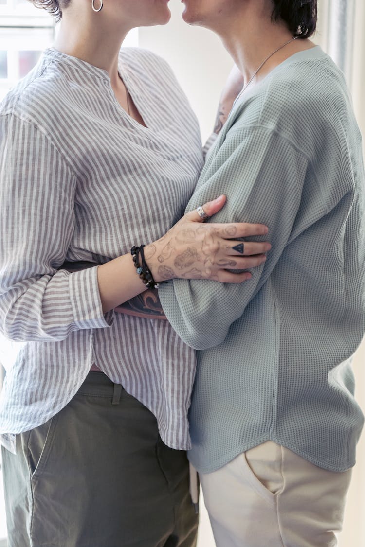 Photo Of A Couple's Bodies Hugging