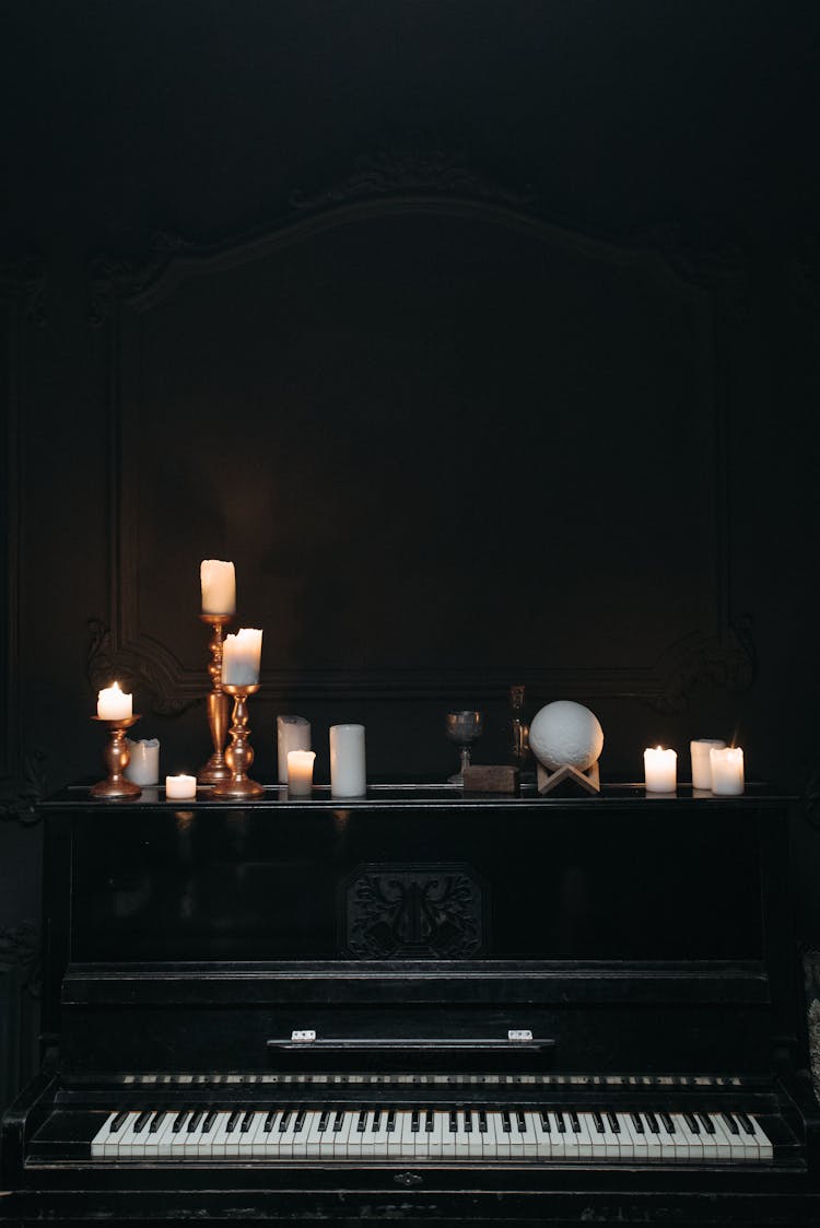 Candles On Top Of A Piano