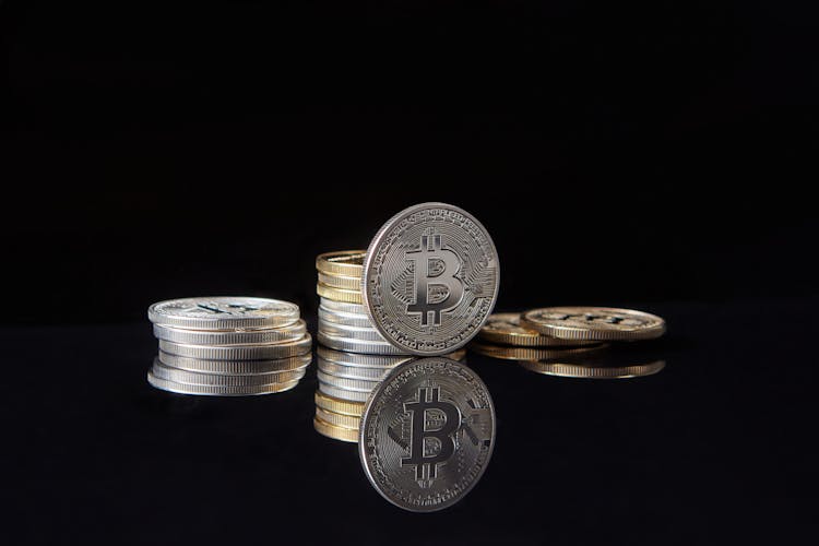 A Stack Of Silver Bitcoin Coins