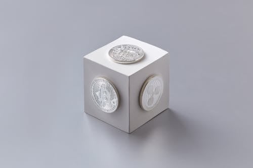 Free A Cube with Coins Stock Photo