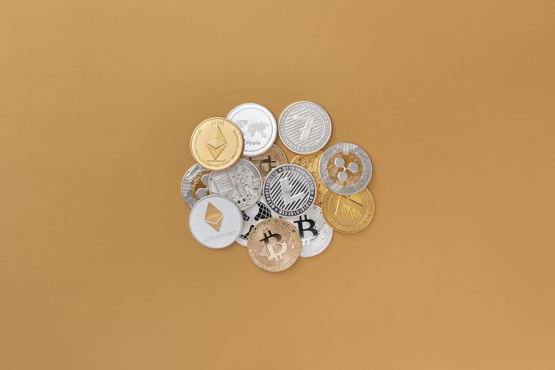 A cluster of cryptocurrencies including Bitcoin, Ethereum on a subtle background symbolizing digital finance.