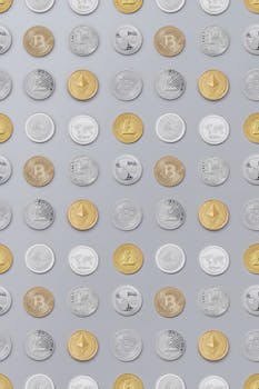 Flat lay of various cryptocurrency coins on white background, showcasing digital currency concept.