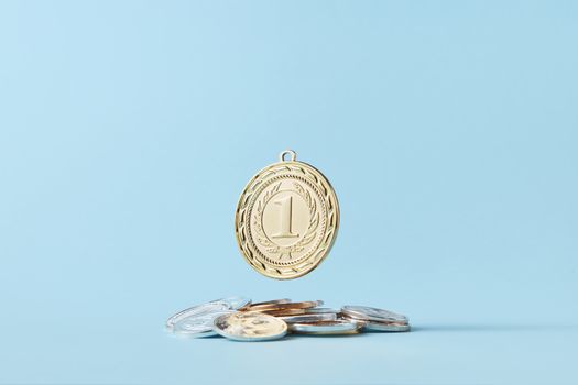 A Round Number Pendant on a Pile of Coins