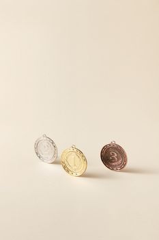 Medals on a Beige Surface