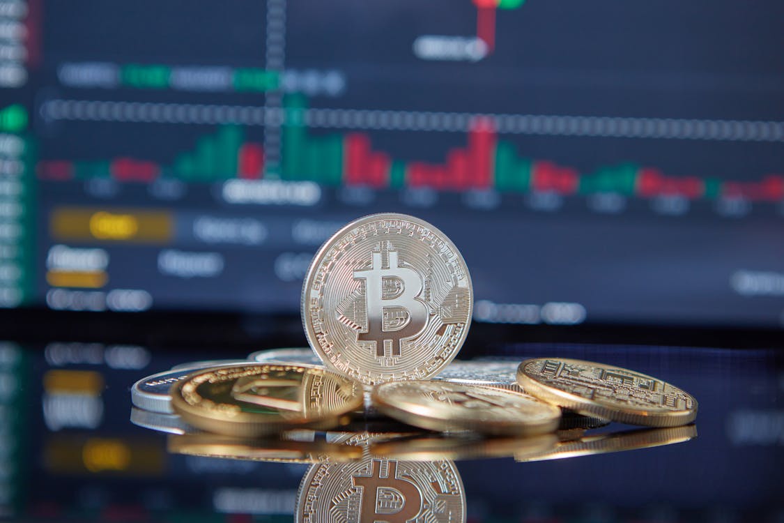Shining Coins with Cryptocurrency Symbol · Free Stock Photo