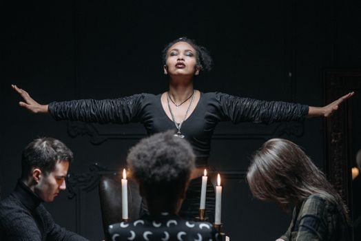 Four People Having a Communication with the Spirit
