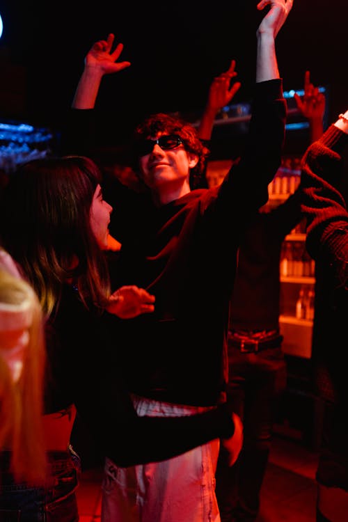 Free People Dancing in a Disco Bar Stock Photo