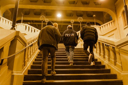 Free People Walking up the Stairs Stock Photo