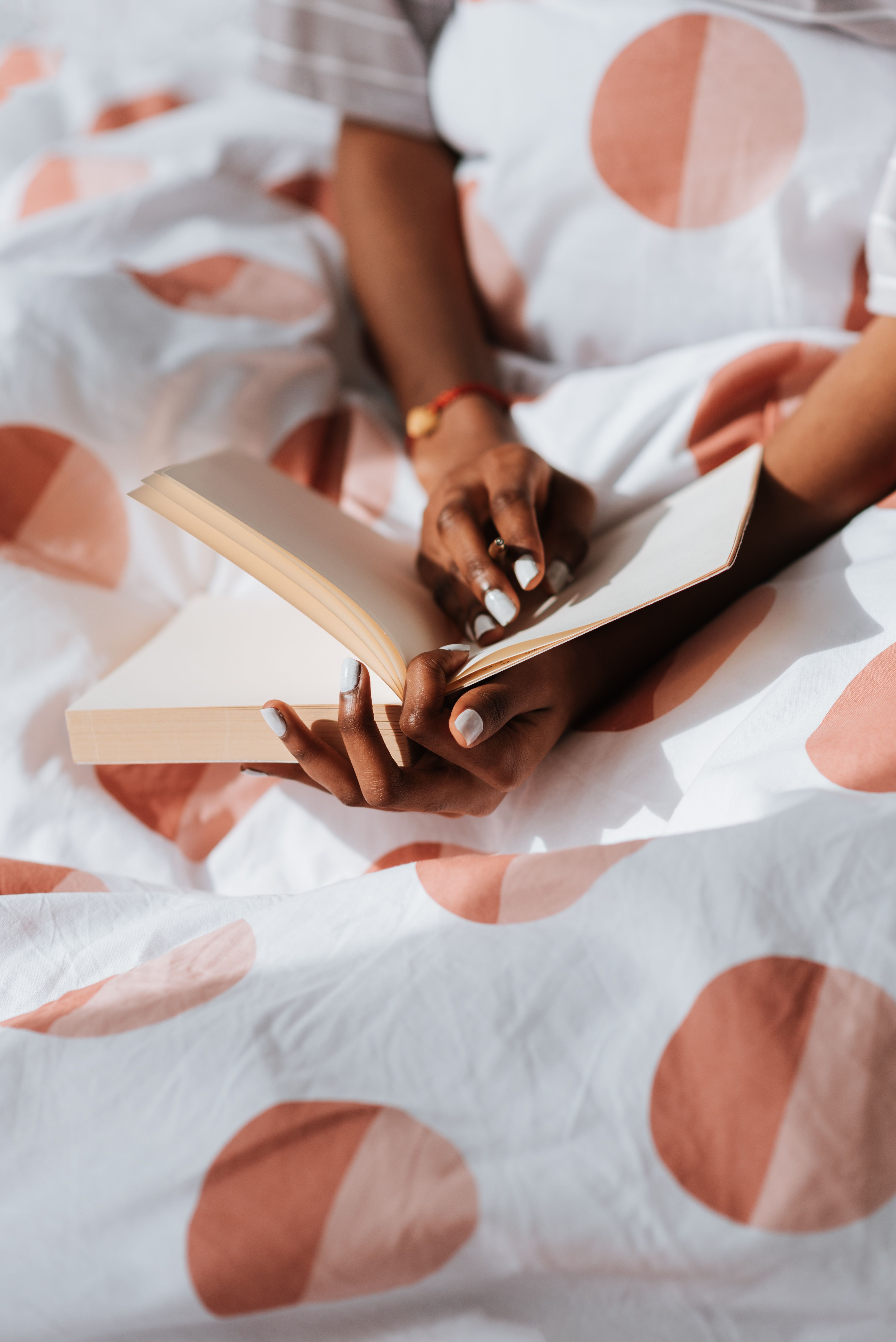 A Person Holding a Book · Free Stock Photo