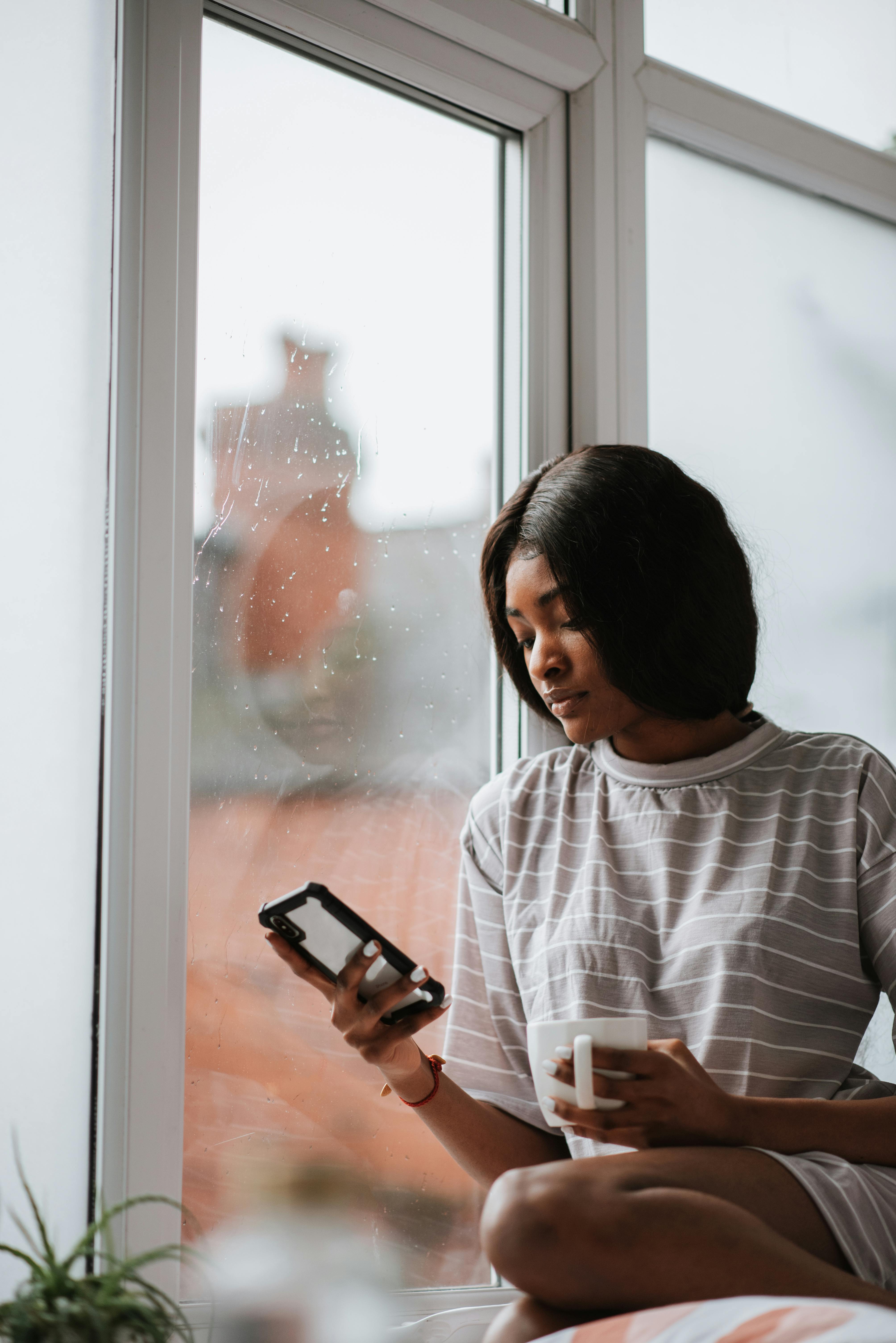 girl looking at her phone