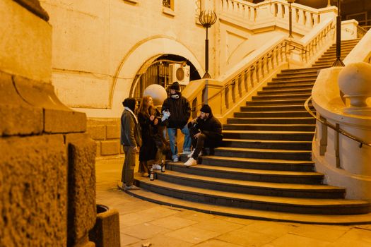 People Walking on Gray Concrete Stairs