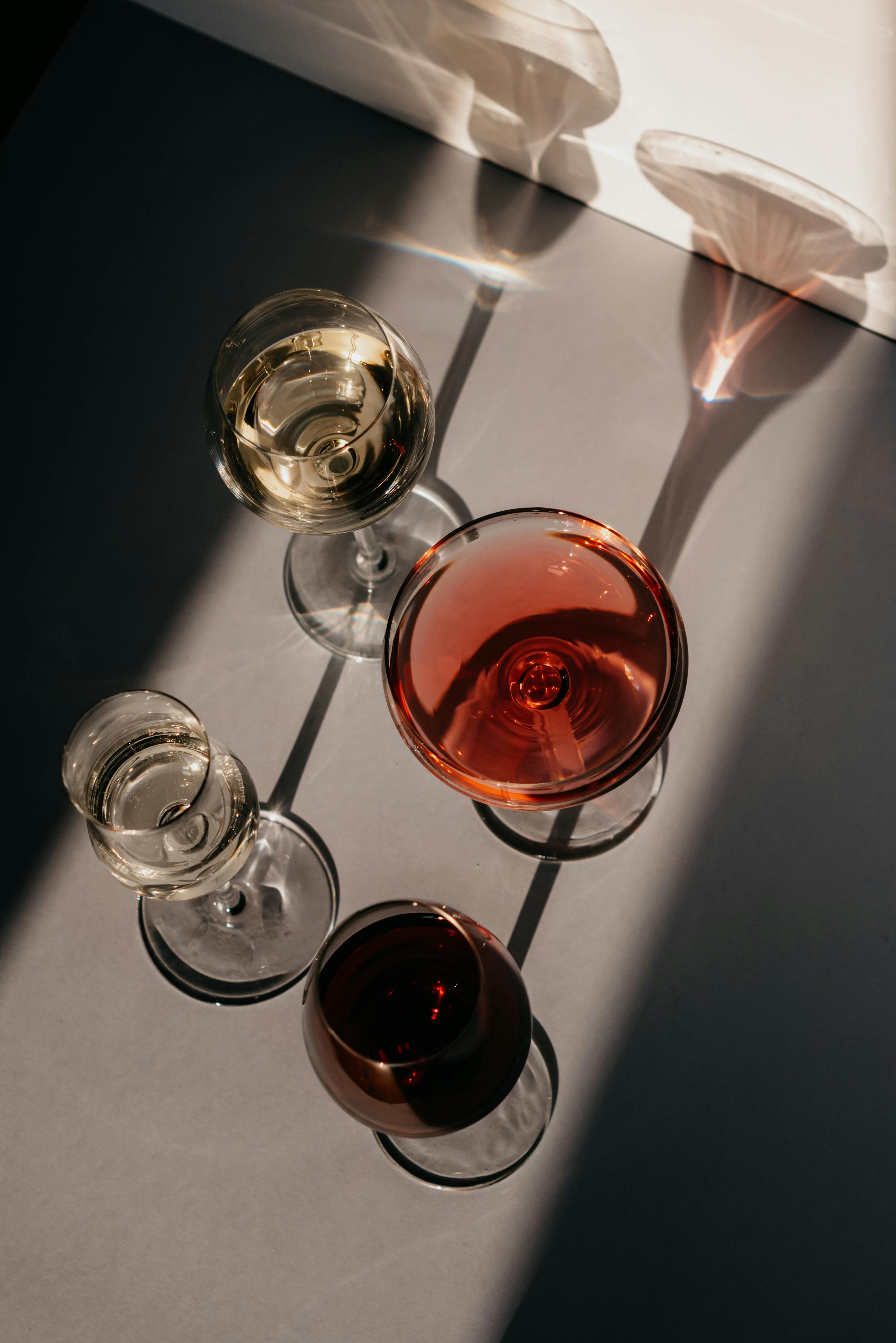 clear wine glass with red liquid