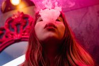 Close-Up Photograph of a Woman Smoking