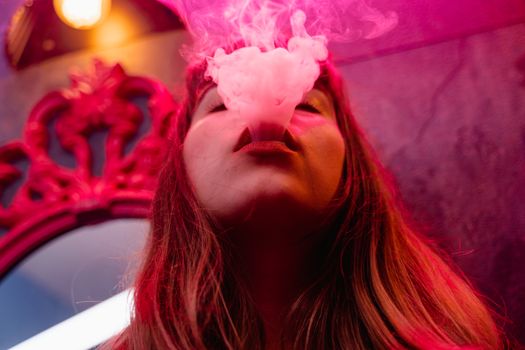 Close-Up Photograph of a Woman Smoking