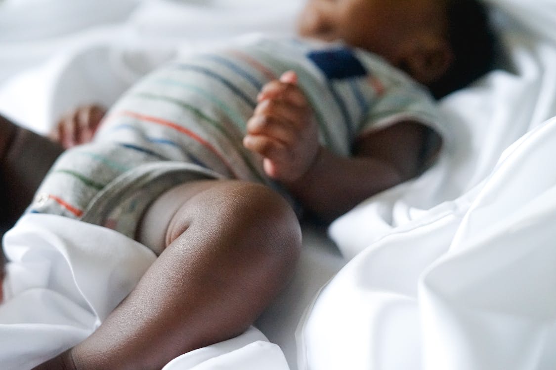 Free Close-Up Shot of a Baby Lying Down Stock Photo