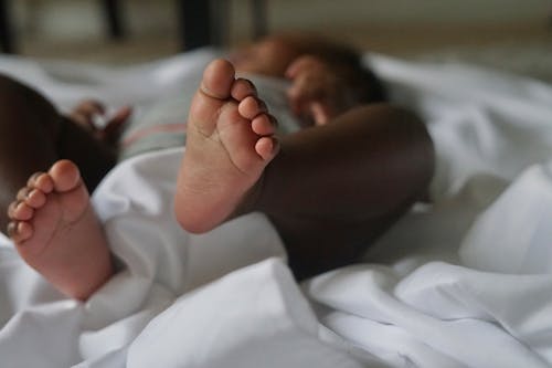Close-Up Photo of a Baby Feet