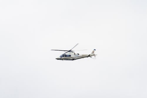 A Helicopter Flying in the Air